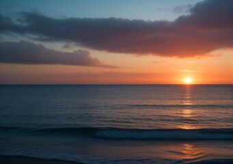 Fototapeta premium Sunset Over Calm Ocean Waves