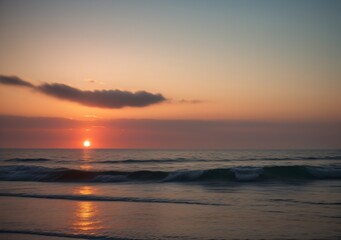 Fototapeta premium Sunset Over Calm Ocean Waves
