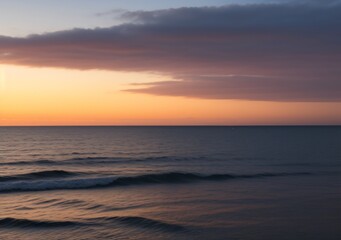 Obraz premium Sunset Over Calm Ocean Waves