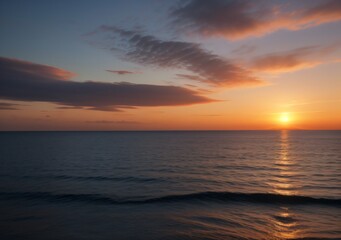 Obraz premium Sunset Over Calm Ocean Waves