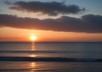 Obraz premium Sunset Over Calm Ocean Waves