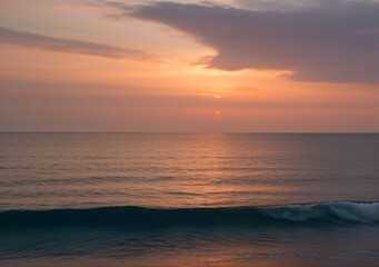 Sunset Over Calm Ocean Waves