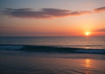 Fototapeta premium Sunset Over Calm Ocean Waves