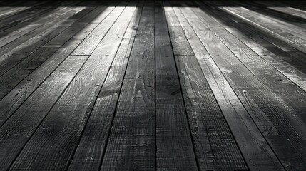 A close-up view of dark wooden floorboards, showcasing texture and light play.