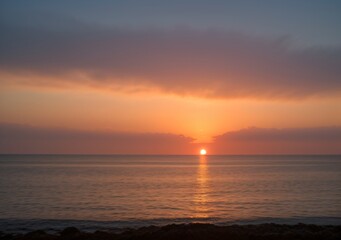 Sunset Over Calm Ocean Waves