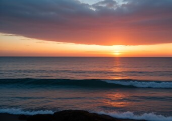 Obraz premium Sunset Over Calm Ocean Waves