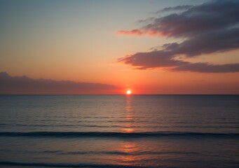 Obraz premium Sunset Over Calm Ocean Waves