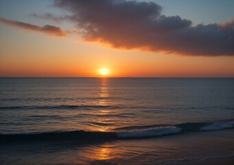 Fototapeta premium Sunset Over Calm Ocean Waves