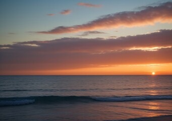 Naklejka premium Sunset Over Calm Ocean Waves