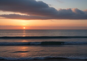 Obraz premium Sunset Over Calm Ocean Waves