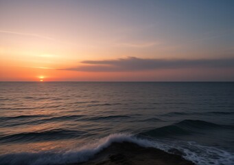 Obraz premium Sunset Over Calm Ocean Waves