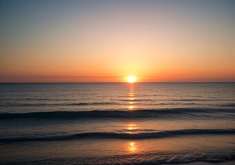 Obraz premium Sunset Over Calm Ocean Waves
