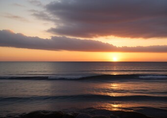 Sunset Over Calm Ocean Waves
