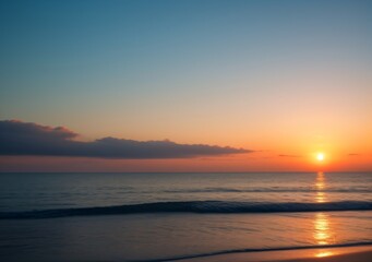 Fototapeta premium Sunset Over Calm Ocean Waves