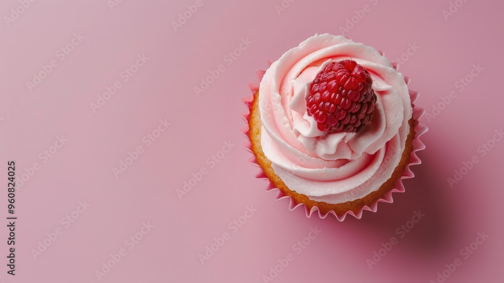 Poster single cupcake with pink frosting and raspberry on top against background