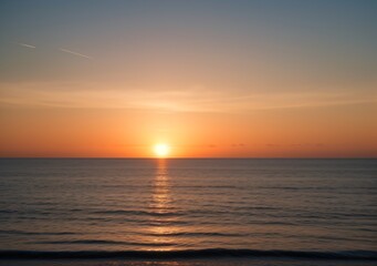 Sunset Over Calm Ocean Waves