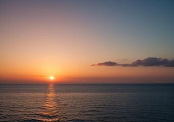 Sunset Over Calm Ocean Waves