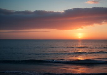 Fototapeta premium Sunset Over Calm Ocean Waves