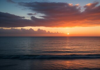 Fototapeta premium Sunset Over Calm Ocean Waves