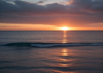 Obraz premium Sunset Over Calm Ocean Waves