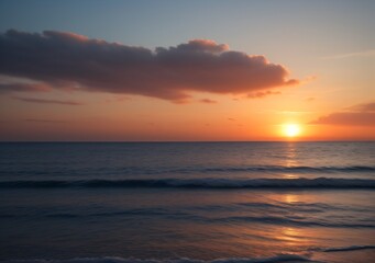 Obraz premium Sunset Over Calm Ocean Waves