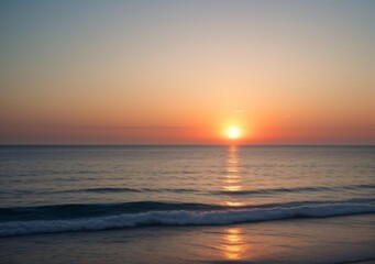 Obraz premium Sunset Over Calm Ocean Waves