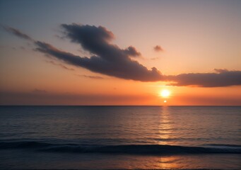Fototapeta premium Sunset Over Calm Ocean Waves