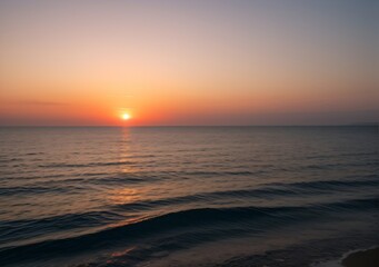 Fototapeta premium Sunset Over Calm Ocean Waves