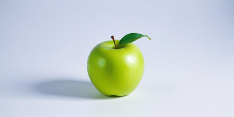 A green apple with a leaf, on a white background