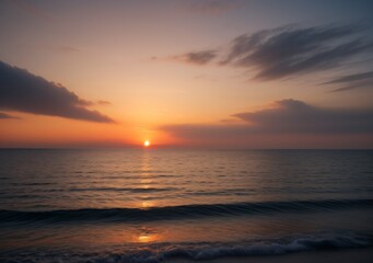 Fototapeta premium Sunset Over Calm Ocean Waves