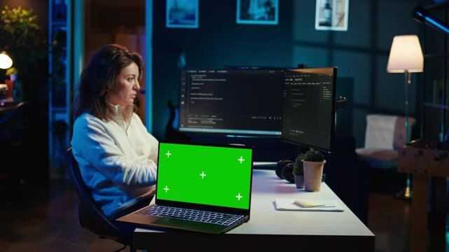 Programmer designing and developing software applications using isolated screen laptop. IT professional implementing and maintaining company systems using mockup notebook, camera B