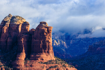 Teapot rock in Sedona dusted with snow make a festive Winter scene.