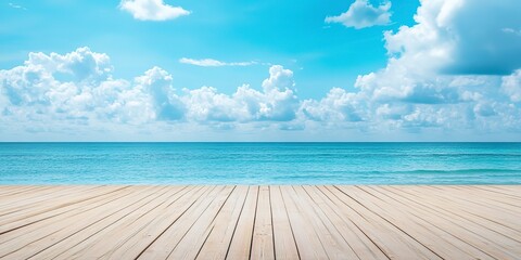 Fototapeta premium empty wooden flooring deck in front and blue summer sky with clouds and sea or ocean with turquoise water and waves in the background summer vacation sea shoreline with deck floor
