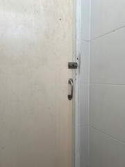 old dirty door in the bathroom.