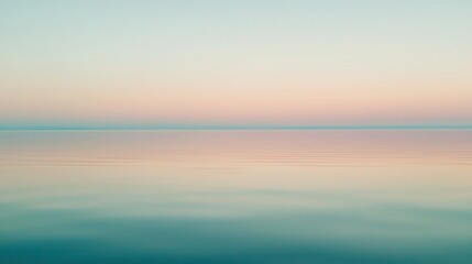 Fototapeta premium Calm Sea at Sunset with Soft Pink and Blue Gradient Sky
