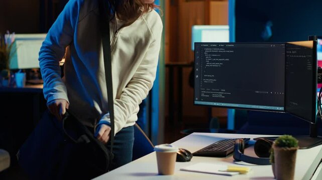 Computer scientist arriving in home office, ready to design and develop software applications. IT expert starting job shift, implementing and maintaining company systems, camera A