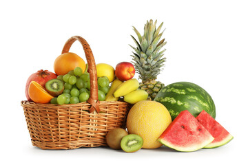 Many fresh ripe fruits in basket isolated on white