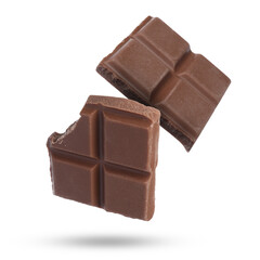 Pieces of sweet chocolate falling on white background