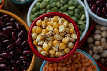 several pots with raw grains for preparing healthy food