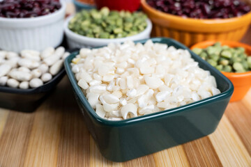 several pots with raw grains for preparing healthy food