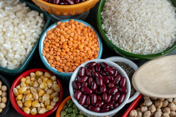 several pots with raw grains for preparing healthy food