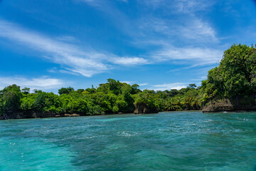 Tropical Island Paradise with Crystal Clear Water, Lush Greenery, and Serene Beaches - Stunning Caribbean Landscape for Eco-Tourism, Adventure, and Unspoiled Nature Travel Destinations