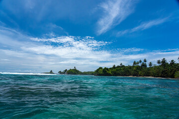 Tropical Island Paradise with Crystal Clear Water, Lush Greenery, and Serene Beaches - Stunning...