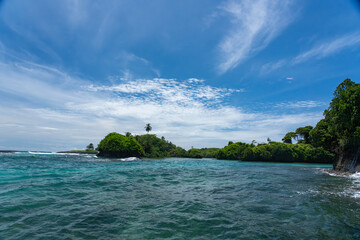 Tropical Island Paradise with Crystal Clear Water, Lush Greenery, and Serene Beaches - Stunning...