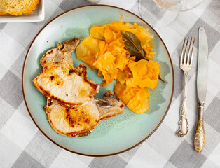 Simple and hearty lunch - dish is made from fried pork meat and stewed cabbage. Meat and vegetables...