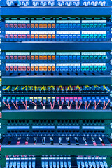 Server rack with colorful patch panel in data server room