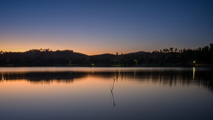 Puddingstone Lake reflects the beautiful surroundings in the morning sun