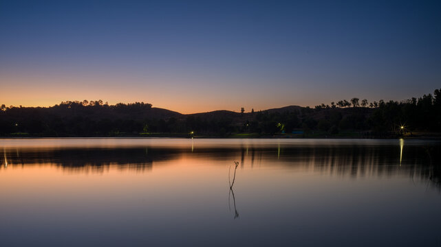 Puddingstone Lake reflects the beautiful surroundings in the morning sun