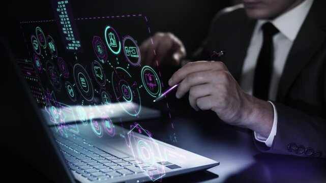 Interacting with a laptop and a simulated holographic panel.