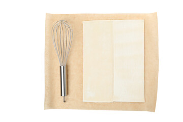 PNG,Baking paper with a metal whisk, isolated on white background